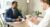 insurance agent talking to a client