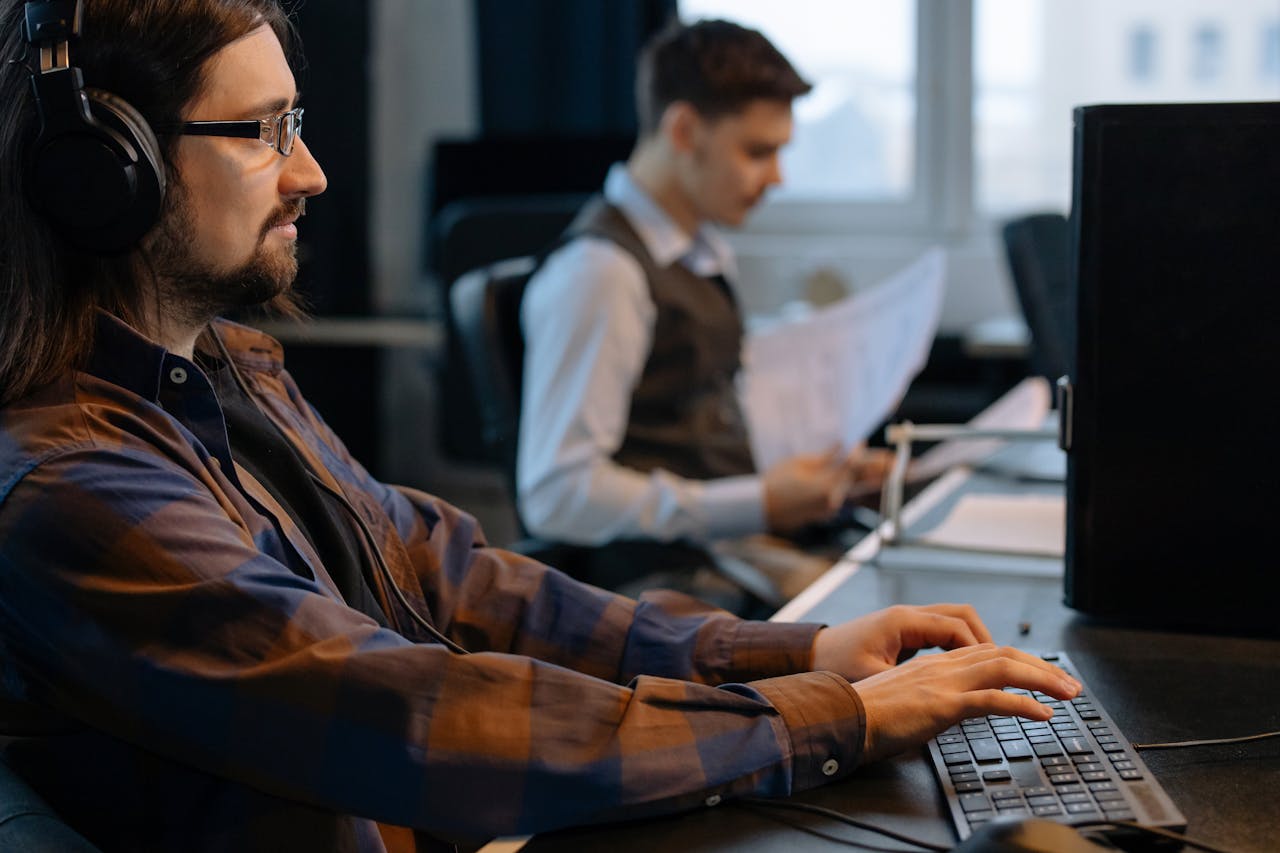 2 developers writing code